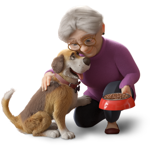 Uma mulher idosa alimentando seu cachorro